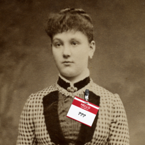 Vintage photo of a victorian lady wearing a modern "my name is" nametag that only has question marks on it.